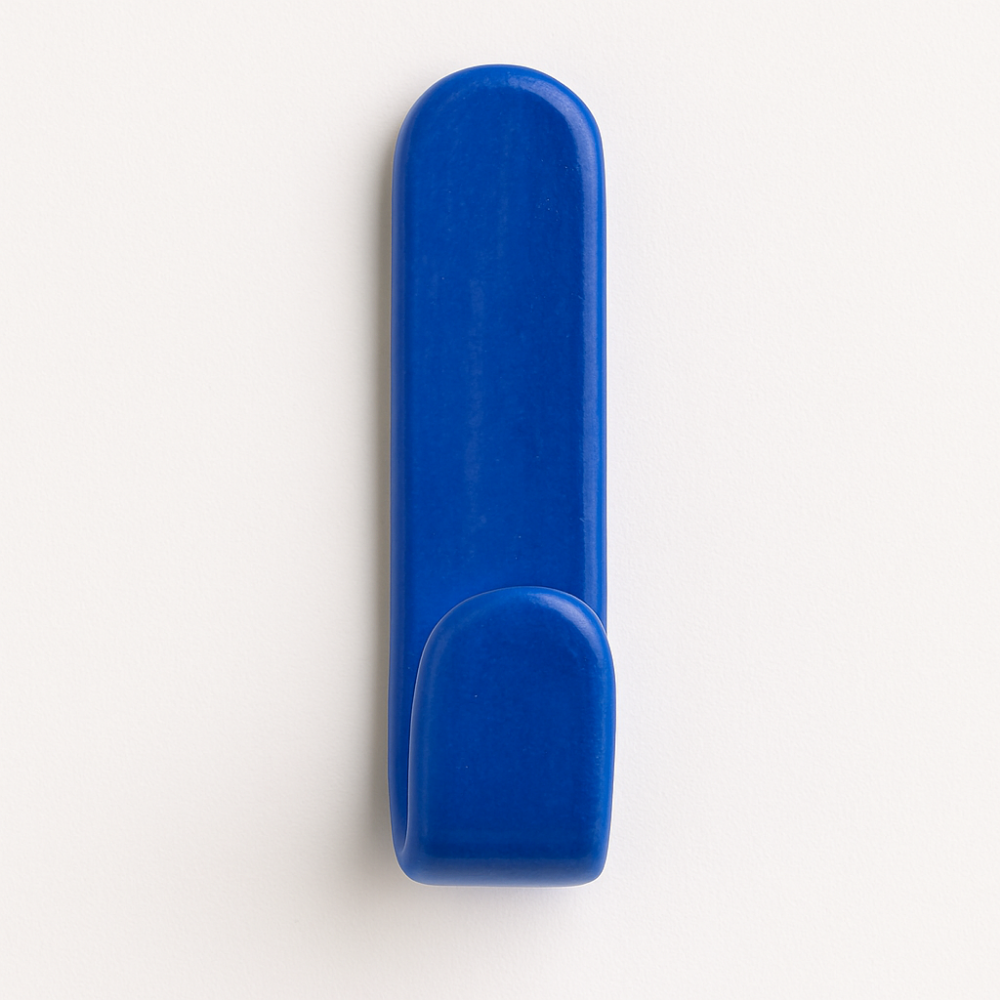 Ocean blue glazed ceramic wall hook on bathroom wall – part of the Colour Pop Collection.