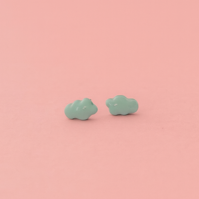 Laguna porcelain cloud earrings on soft pink background