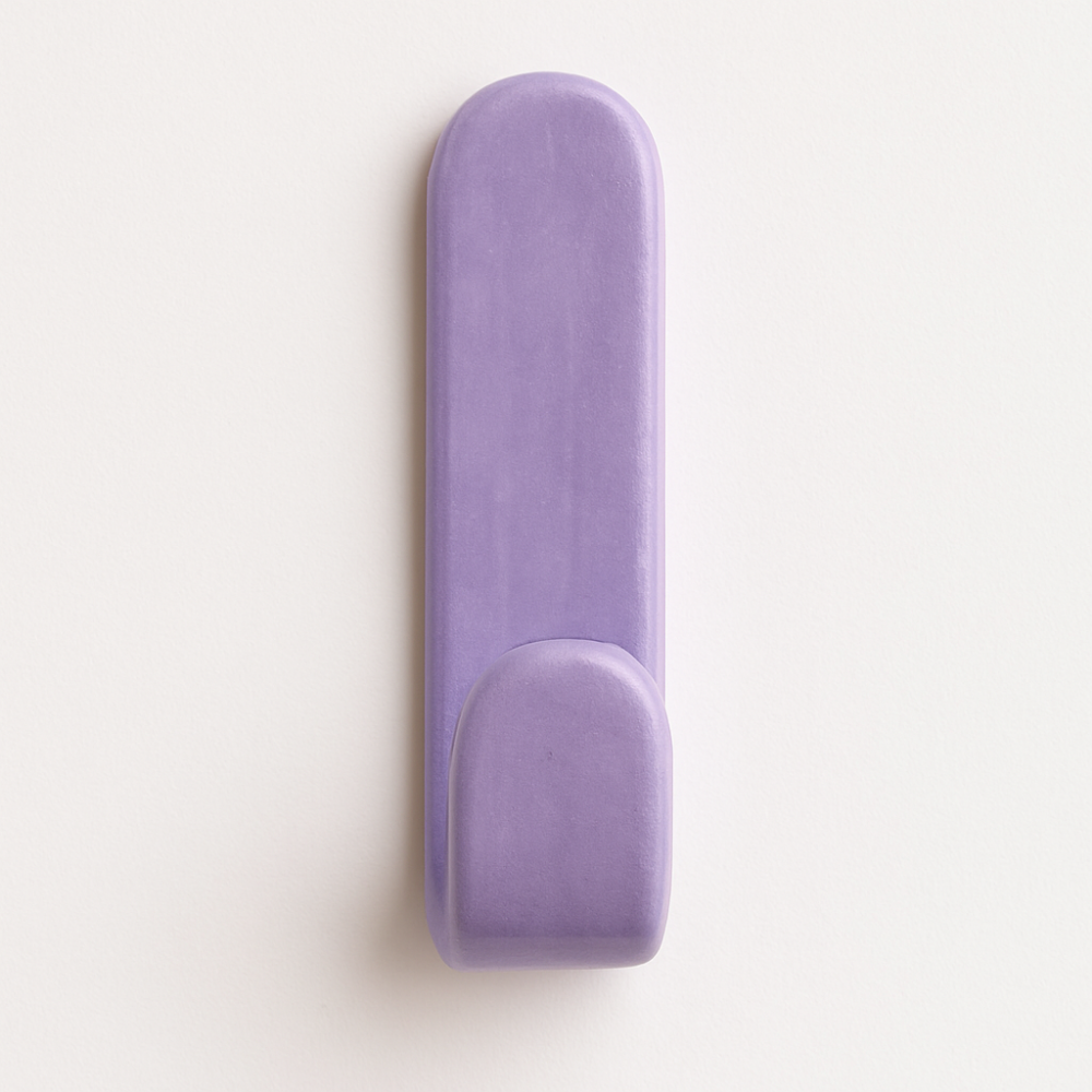 Lilac glazed ceramic wall hook on bathroom wall – part of the Colour Pop Collection.