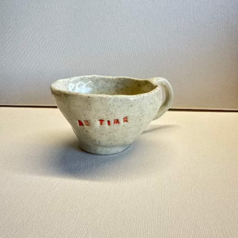 Close-up of a handmade clay cup created in a kids pottery class