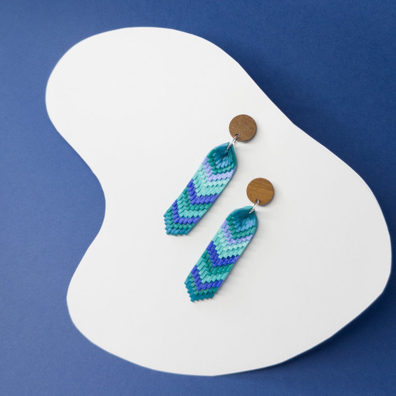 Handmade polymer clay chevron dangle earrings in blue and green with wooden stud