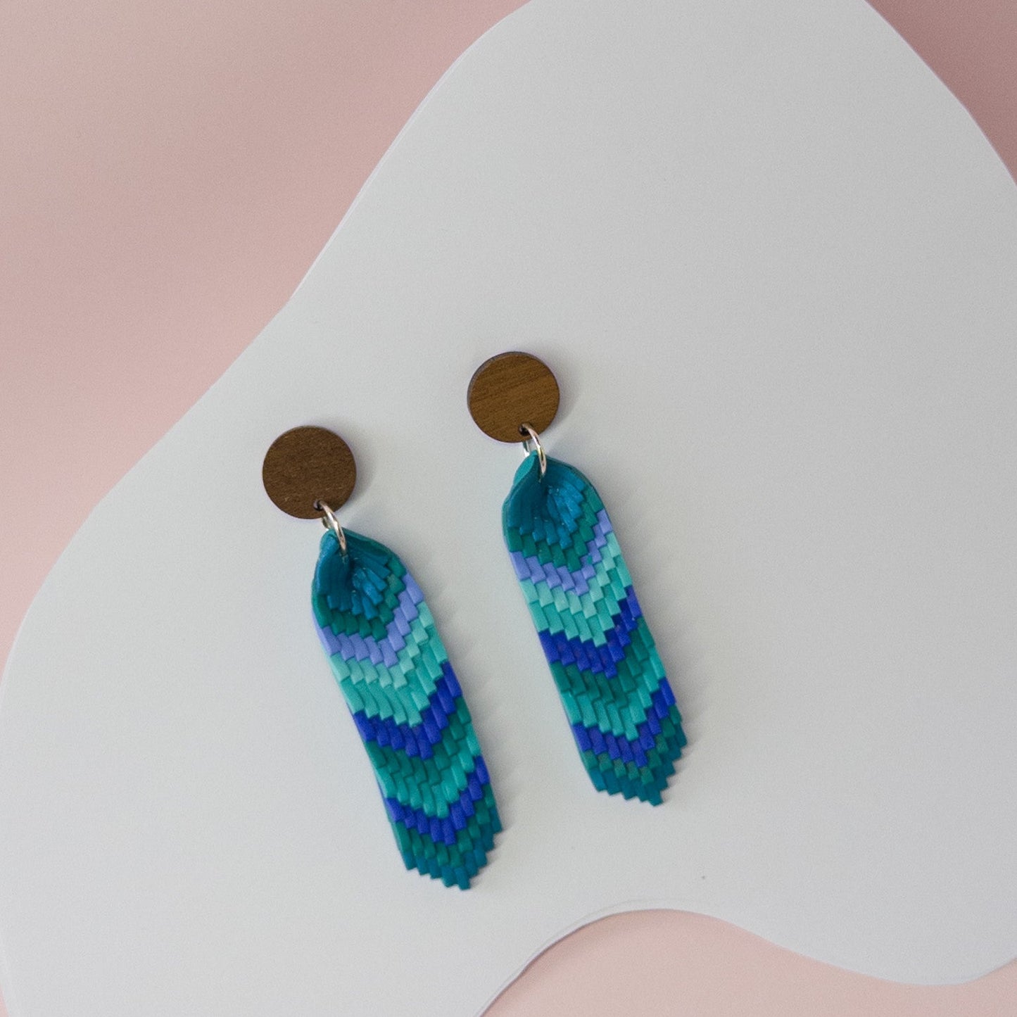 Handmade polymer clay chevron dangle earrings in blue and green with wooden stud