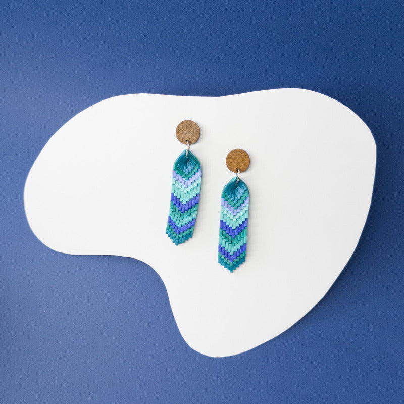 Handmade polymer clay chevron dangle earrings in blue and green with wooden stud