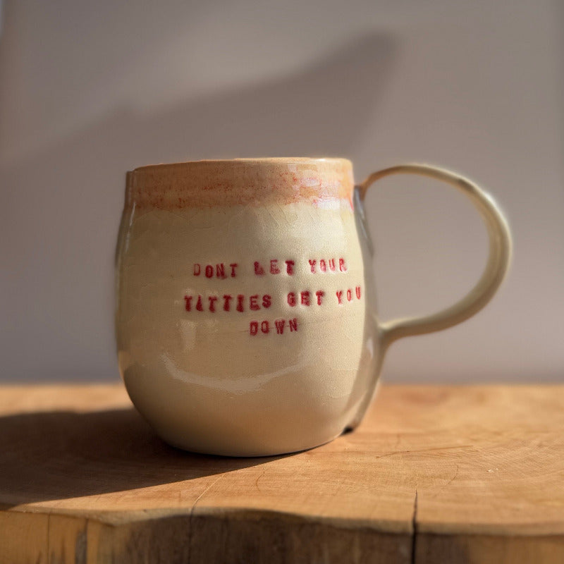 Handmade ceramic boobie cup with a natural glaze, designed in collaboration with Tash Robinson – 20% of sales donated to the Jane McGrath Foundation