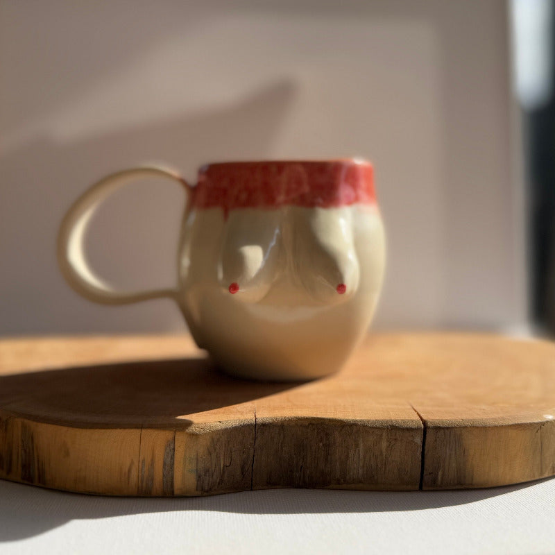 Handmade ceramic boobie cup with a natural glaze, designed in collaboration with Tash Robinson – 20% of sales donated to the Jane McGrath Foundation
