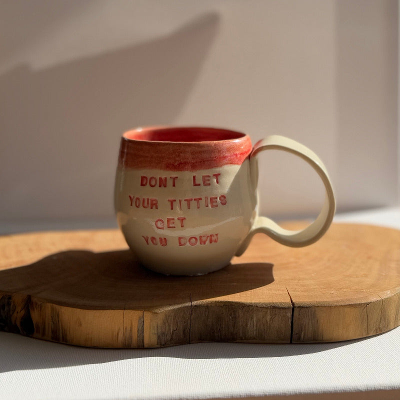 Handmade ceramic boobie cup with a natural glaze, designed in collaboration with Tash Robinson – 20% of sales donated to the Jane McGrath Foundation