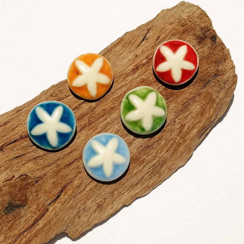 Orange, green, red, blue and baby blue gumnut studs.
