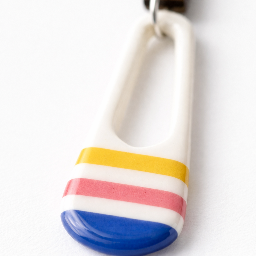 Lightweight statement earrings inspired by sunrise colours and ocean tones