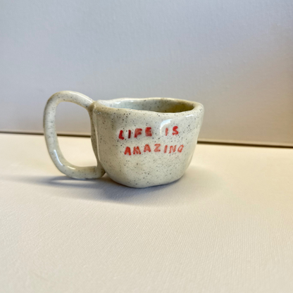 Close-up of a handmade clay cup created in a kids pottery class