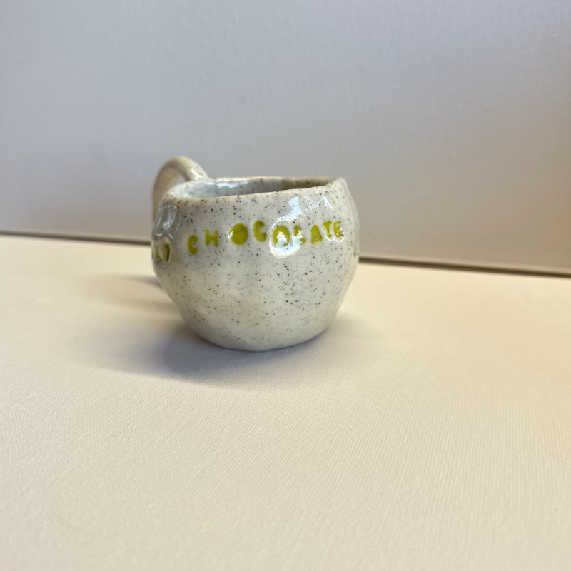 Close-up of a handmade clay cup created in a kids pottery class