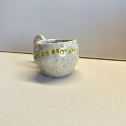 Close-up of a handmade clay cup created in a kids pottery class