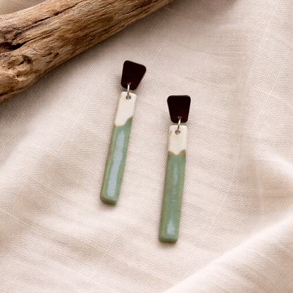 Pair of green/blue seafoam porcelain earrings with  wood studs.