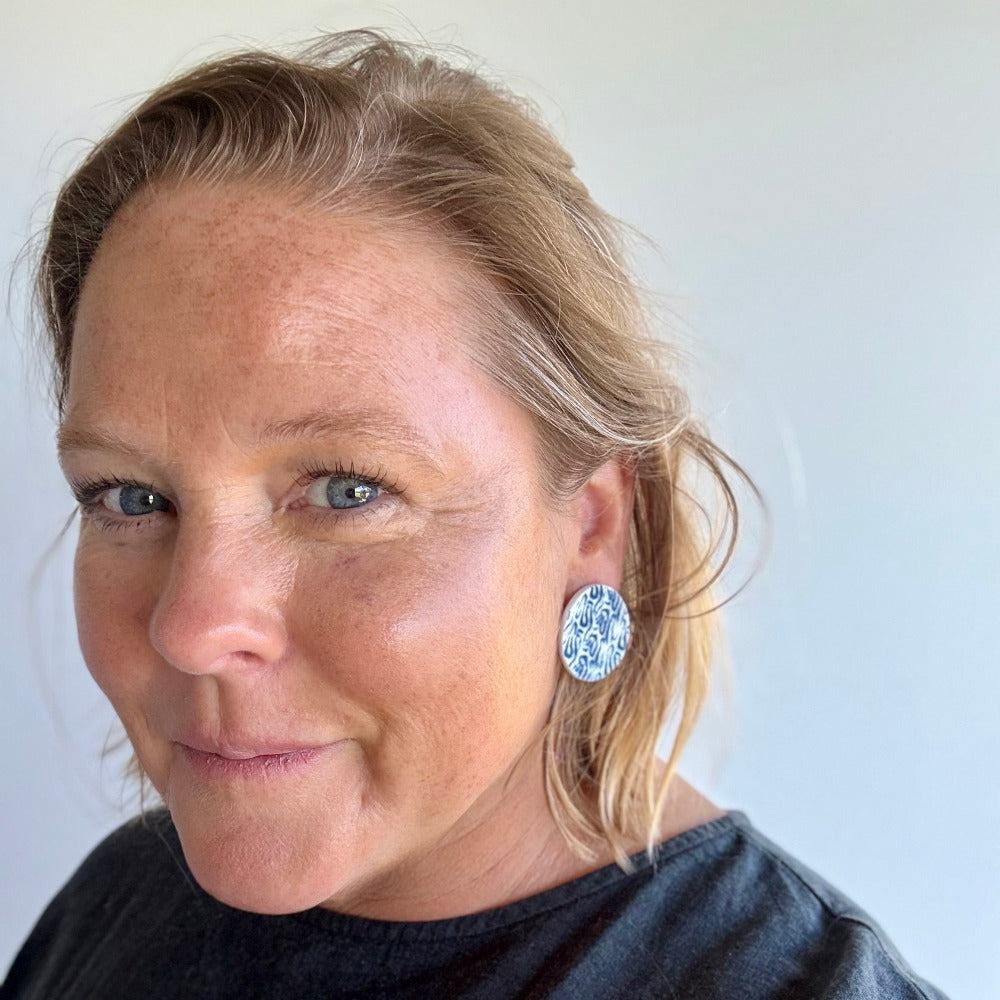 Blue and white porcelain stud earrings hand-stamped with coral texture, handmade on Phillip Island