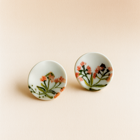 Large porcelain stud earrings with hand-painted bursting gumnut flowers.