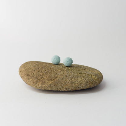 Lagoon porcelain sea urchin earrings – small coastal studs for adults and kids.