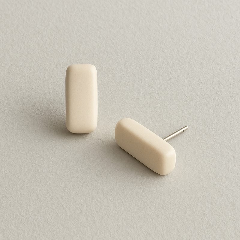 White porcelain bar earrings that are studs and minimalist in style