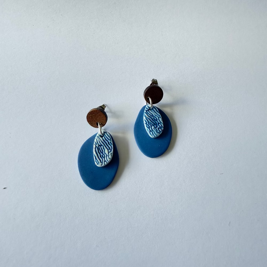 Blue and white porcelain coral textured dangle earrings — handmade on Phillip Island, Australia. Each pair is unique and ocean-inspired.