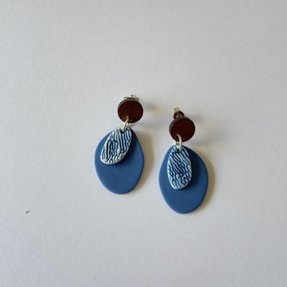 Blue and white porcelain coral textured dangle earrings — handmade on Phillip Island, Australia. Each pair is unique and ocean-inspired.