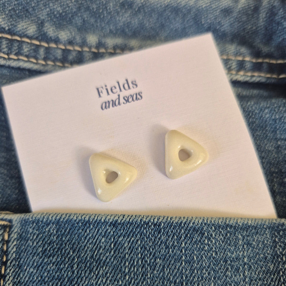 White porcelain arrow studs