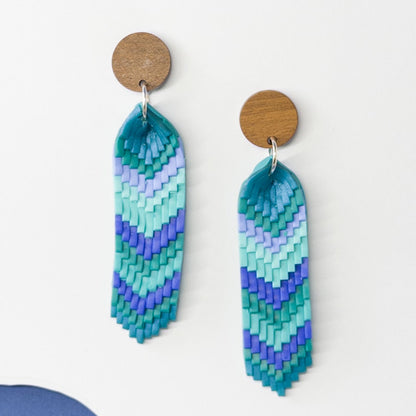 Handmade polymer clay chevron dangle earrings in blue and green with wooden stud