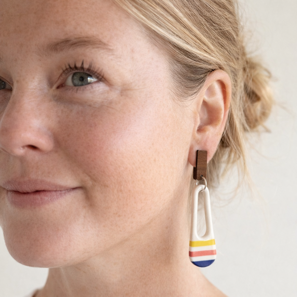 Modern drop earrings with colourful stripe design and timber stud tops