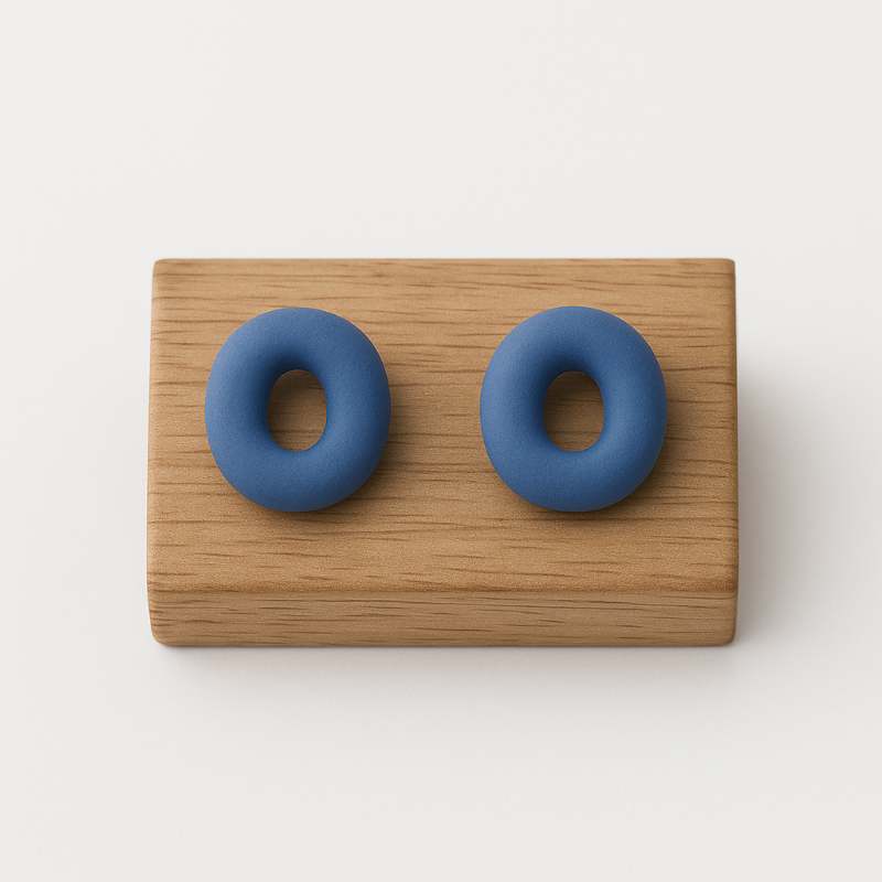 Handmade cobalt porcelain earrings photographed on white background