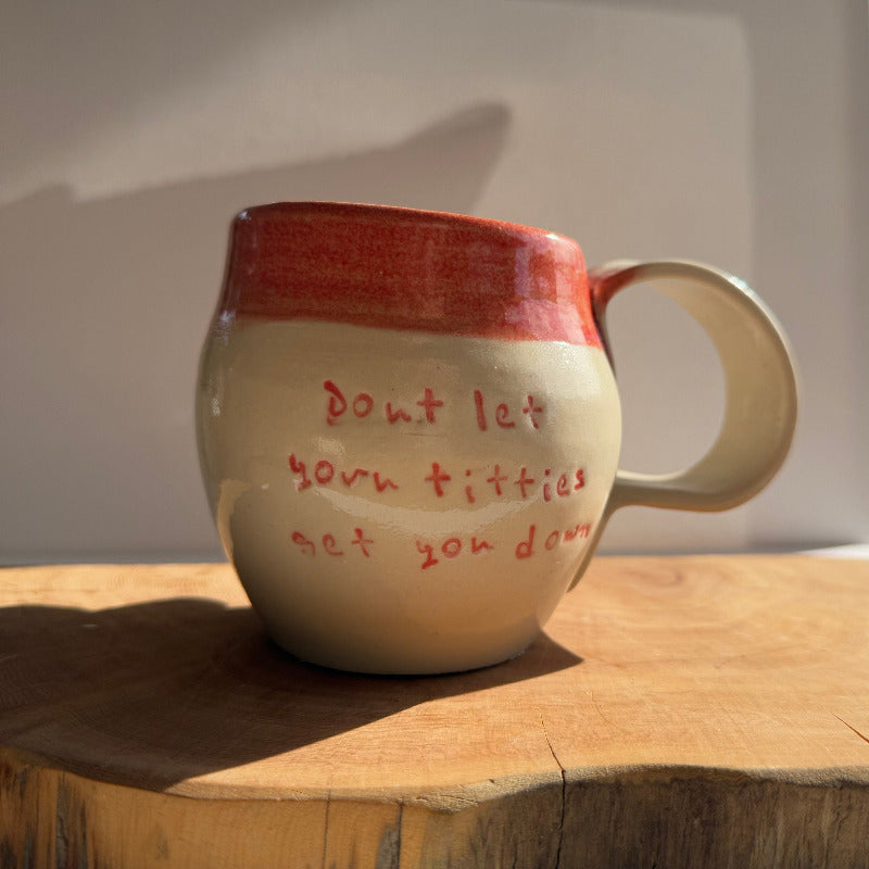 Handmade ceramic boobie cup with a natural glaze, designed in collaboration with Tash Robinson – 20% of sales donated to the Jane McGrath Foundation